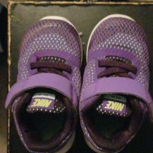 purple Nike with velcro straps size 5 toddler
